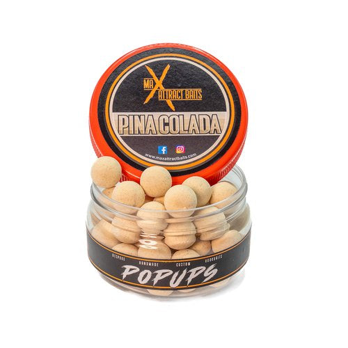 Pot of max attract baits pinacolada popups set in white back ground