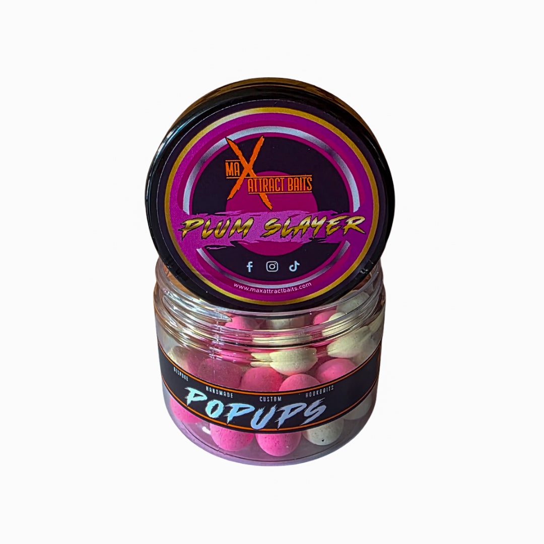 Pot of max attract baits Plum Slayer popups set in white back ground
