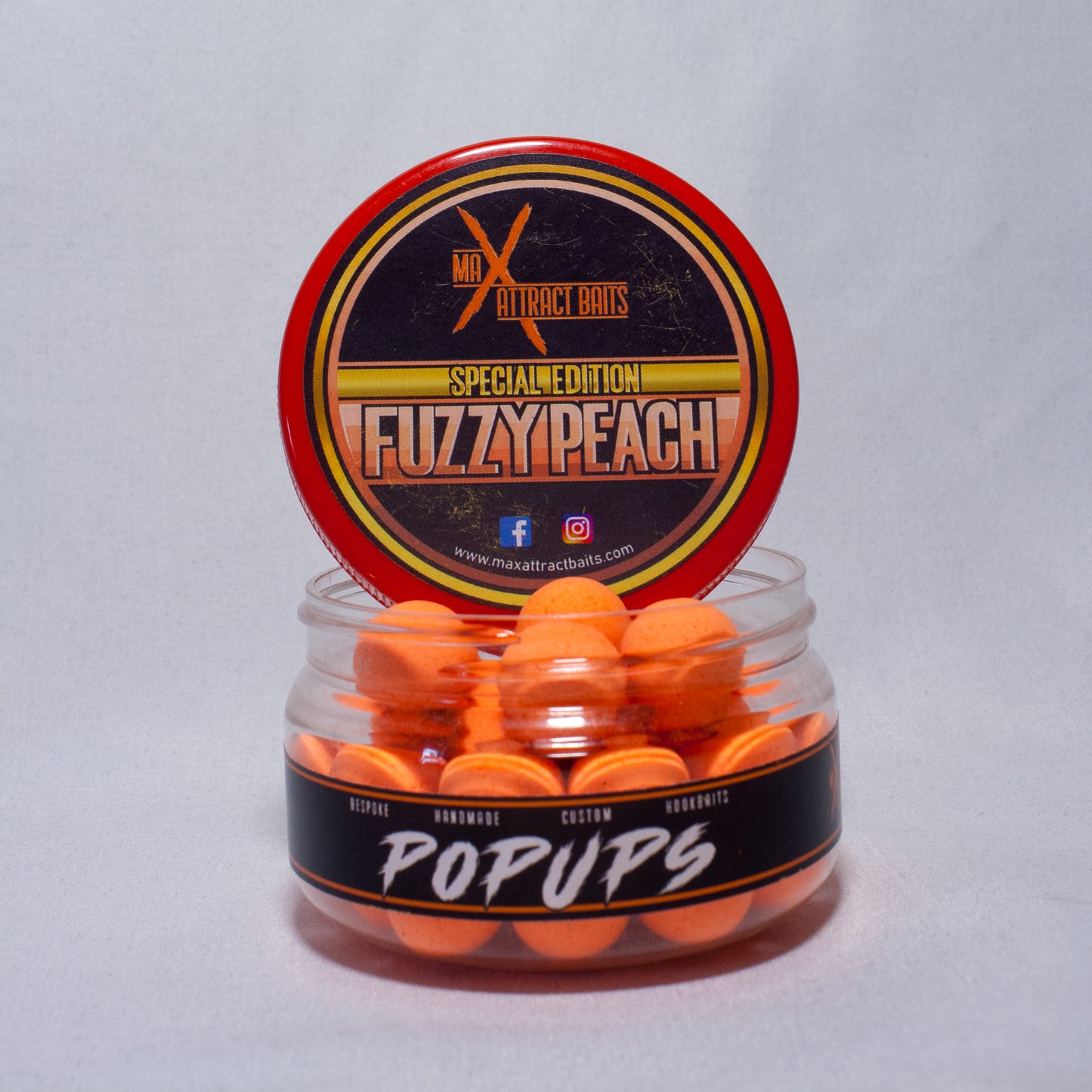 Pot of max attract baits Fuzzy Peach orange popups set in white back ground