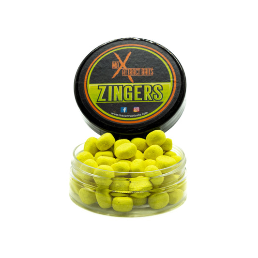 Pot of max attract baits Zingers corn toppers set in white back ground