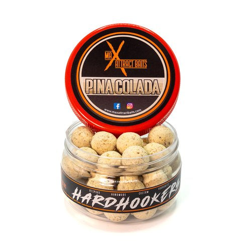 Pot of max attract baits pinacolada hard hookers set in white back ground